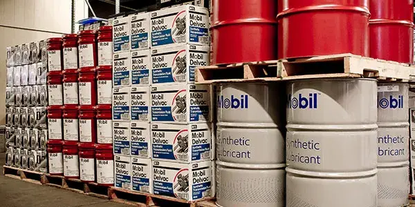 Mobil tubs and boxes stacked in warehouse